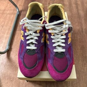 Purple and Pink Sneakers with Yellow Accents